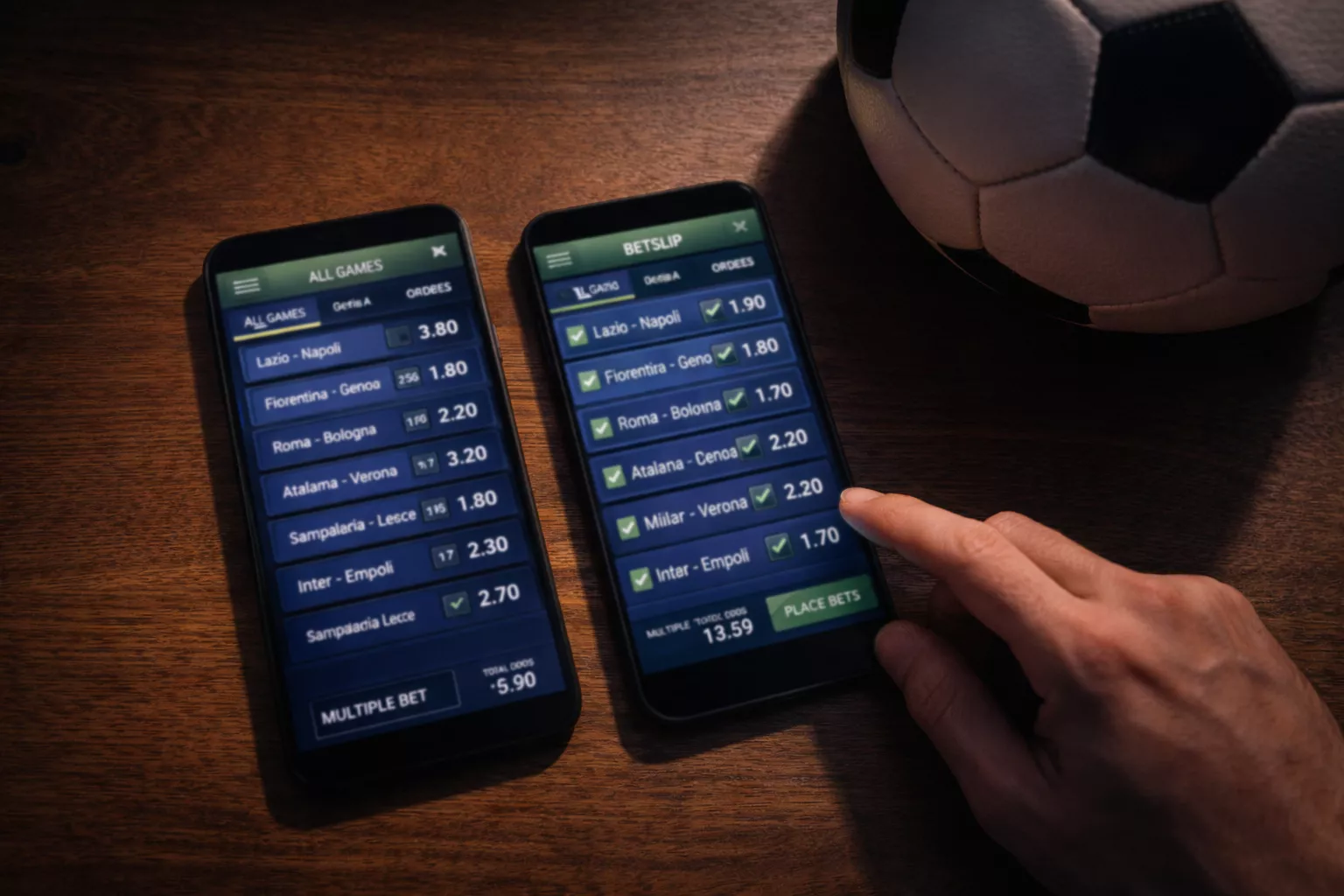 Due smartphone affiancati su un tavolo con una partita di calcio sullo sfondo